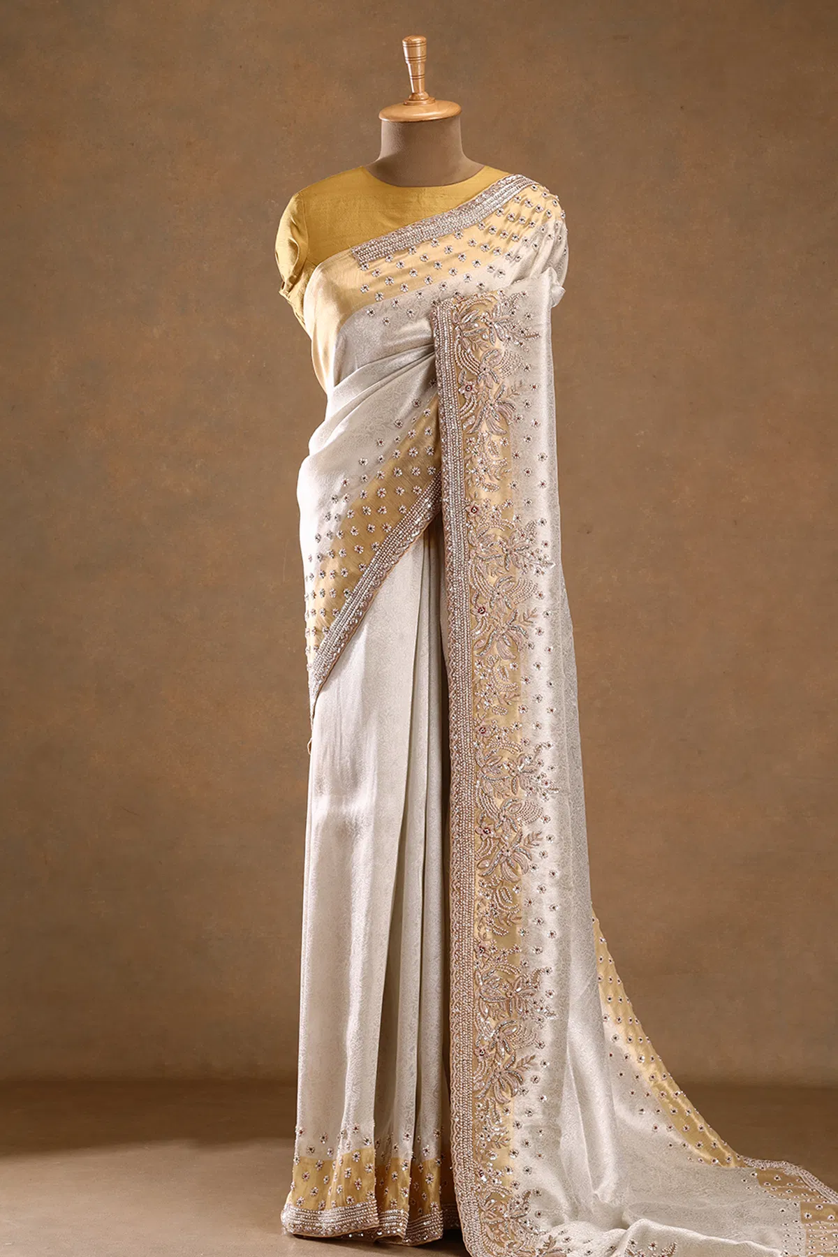 Ivory zardosi embroidered tissue designer saree